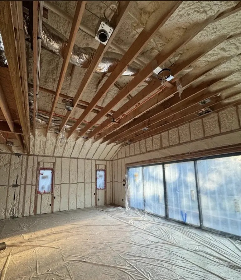 Interior walls and ceiling insulated with spray foam during new construction in Indian Wells